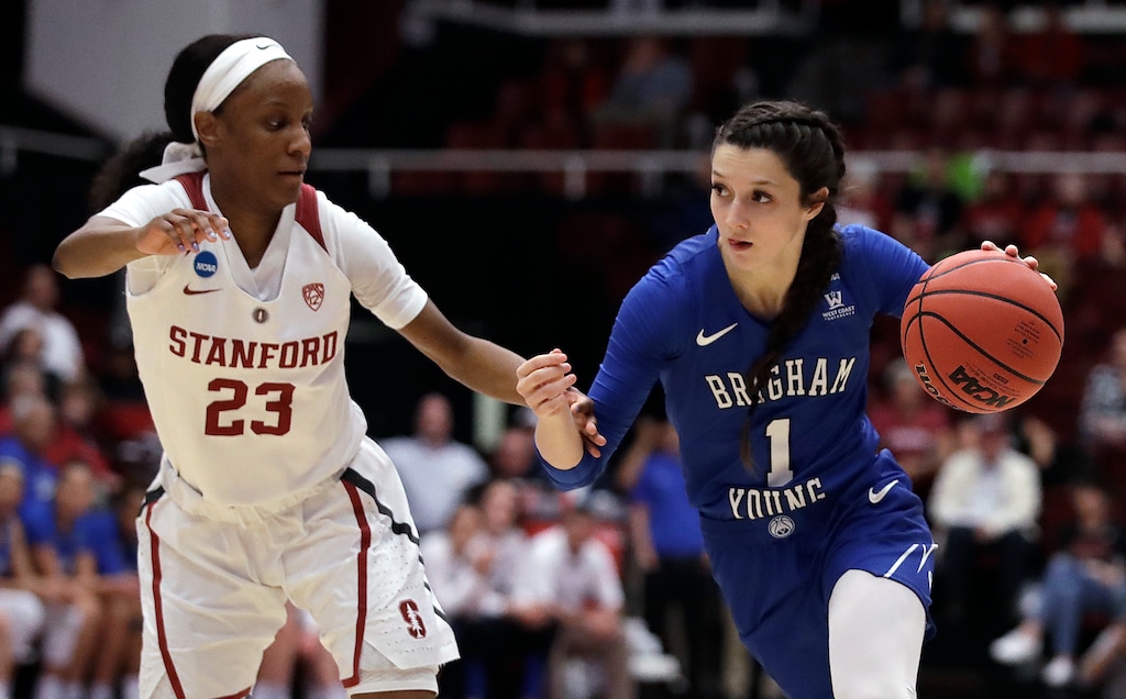 Stanford's Kiana Williams, left, guards BYU's Brenna Chase during the first half of a second-round game in the NCAA women's college basketball tournament Monday, March 25, 2019, in Stanford, Calif. (AP Photo/Ben Margot)