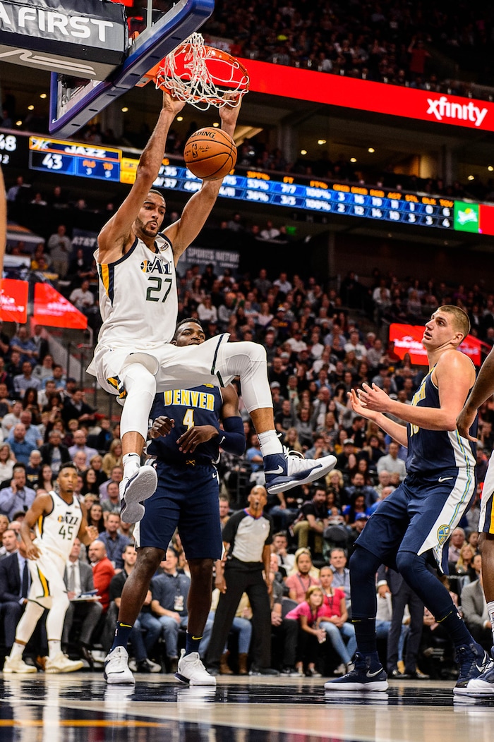 (Trent Nelson | The Salt Lake Tribune)  Utah Jazz center Rudy Gobert (27) dunks as the Utah Jazz host the Denver Nuggets, NBA basketball in Salt Lake City, Wednesday October 18, 2017.