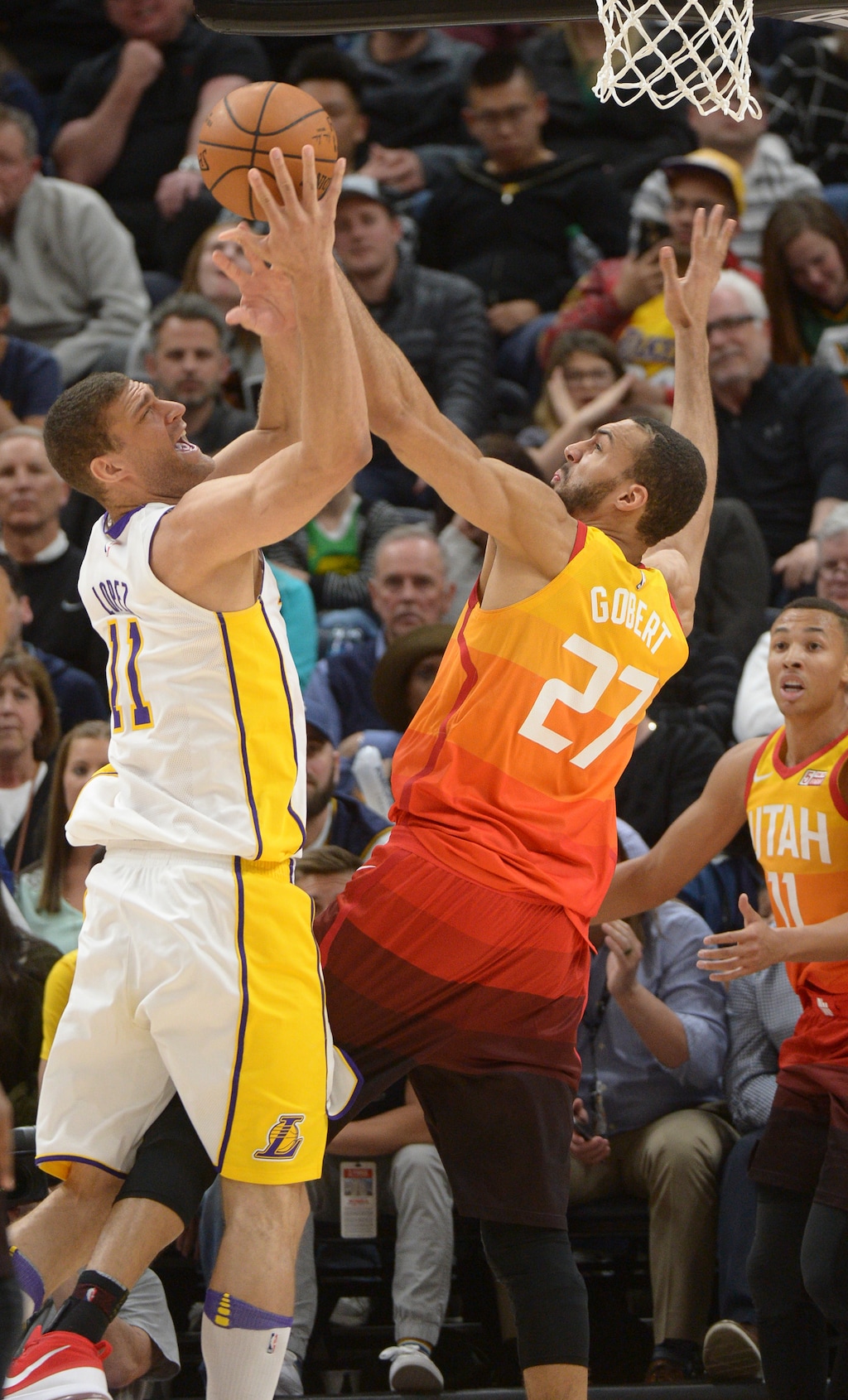 (Leah Hogsten  |  The Salt Lake Tribune)  Utah Jazz center Rudy Gobert (27) tries to stop Los Angeles Lakers center Brook Lopez (11) as the Utah Jazz host the Los Angeles Lakers at Vivint Smart Home Arena Tuesday, April 3, 2018