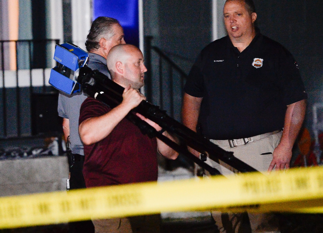 (Francisco Kjolseth  |  The Salt Lake Tribune)  Police investigators search a home at 547 N. 1000 West in Salt Lake City as part of the disappearance of University of Utah student MacKenzie Lueck on Wed. June 26, 2019.