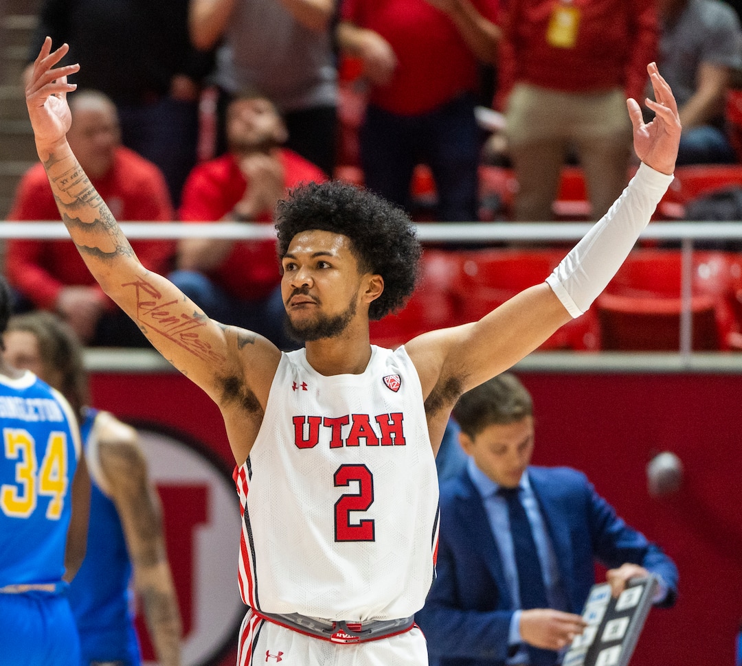 (Rick Egan | The Salt Lake Tribune) Utah guard Mike Saunders Jr. (2) reacts after hitting a big 3-point-shot for the Utes, in PAC-12 basketball action between Utah Utes and UCLA Bruins, at the Jon M. Huntsman Center, Thursday, February. 23, 2022.