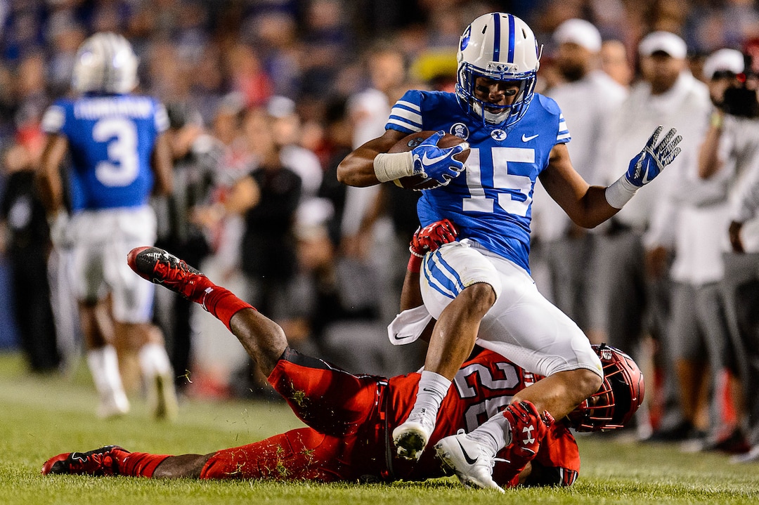 (Trent Nelson | The Salt Lake Tribune)  Utah Utes defensive back Javelin Guidry (28) brings down Brigham Young Cougars wide receiver Aleva Hifo (15) as BYU hosts Utah, NCAA football in Provo, Saturday September 9, 2017.