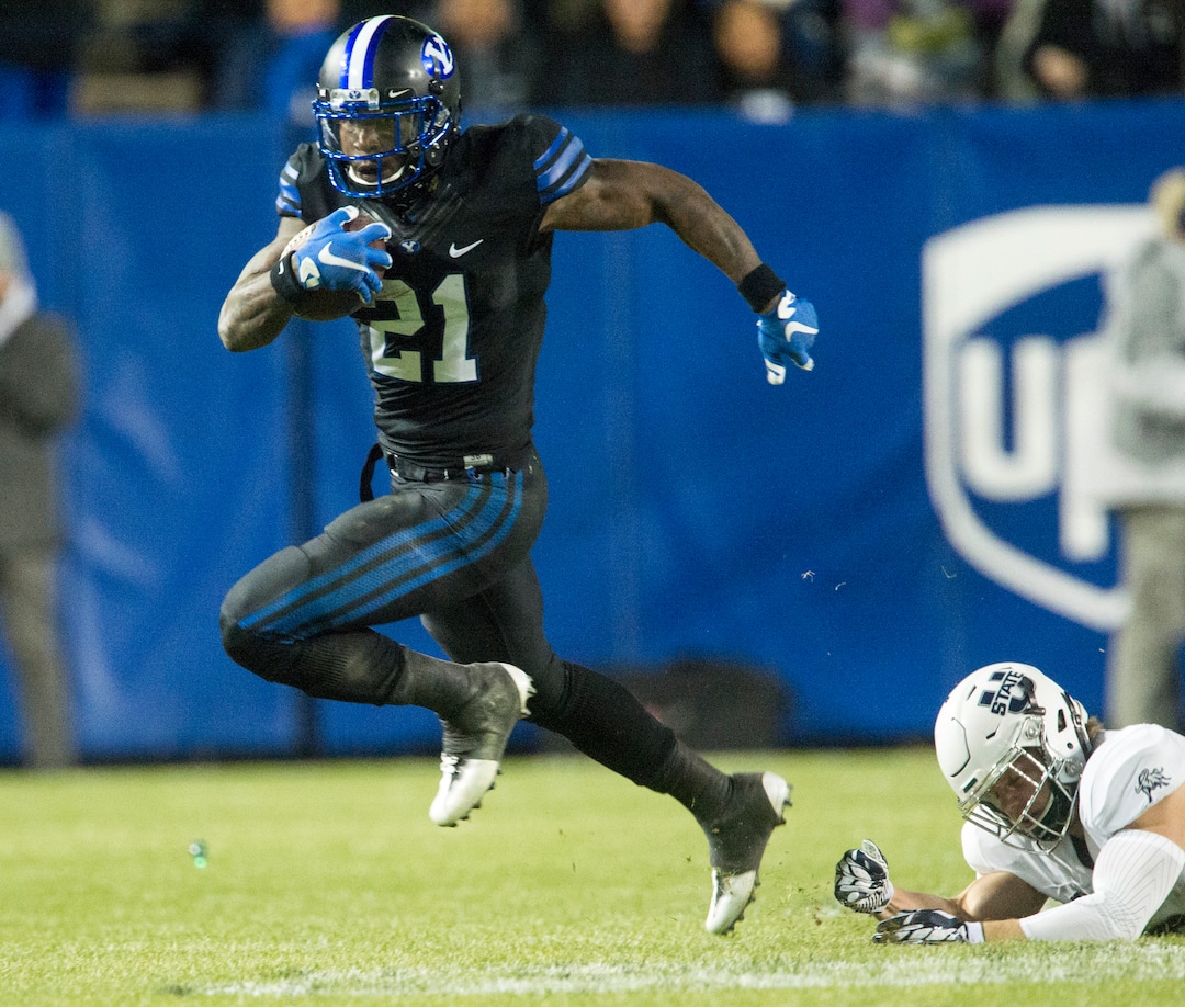 Rick Egan  |  The Salt Lake TribuneBrigham Young running back Jamaal Williams (21) runs the ball for the Cougars, in football action, BYU vs Utah State, at Lavell Edwards Stadium in Provo,  Saturday, November 26, 2016.