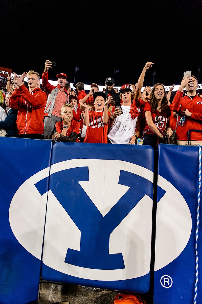 (Trent Nelson | The Salt Lake Tribune) Utah fans celebrate the win as BYU hosts Utah, NCAA football in Provo, Saturday September 9, 2017.