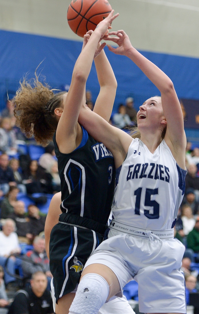 (Leah Hogsten  |  The Salt Lake Tribune)   Copper Hills High School girls' basketball team defeated Pleasant Grove High School 66-25 during their Class 6A girls' basketball playoff opener at Salt Lake Community College Tuesday, Feb. 20, 2018. 