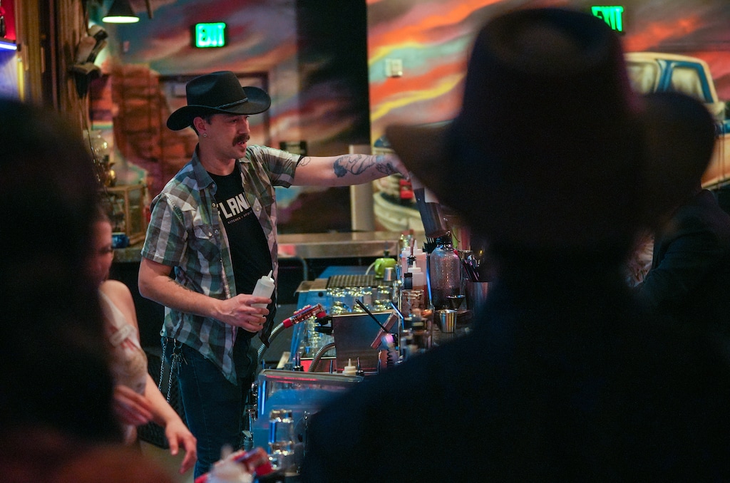 (Chris Samuels | The Salt Lake Tribune) Bartending at the Hidden Boot Saloon, a pop-up bar in Flanker Kitchen & Sporting Club at The Gateway in Salt Lake City, Friday, Feb. 21, 2025.