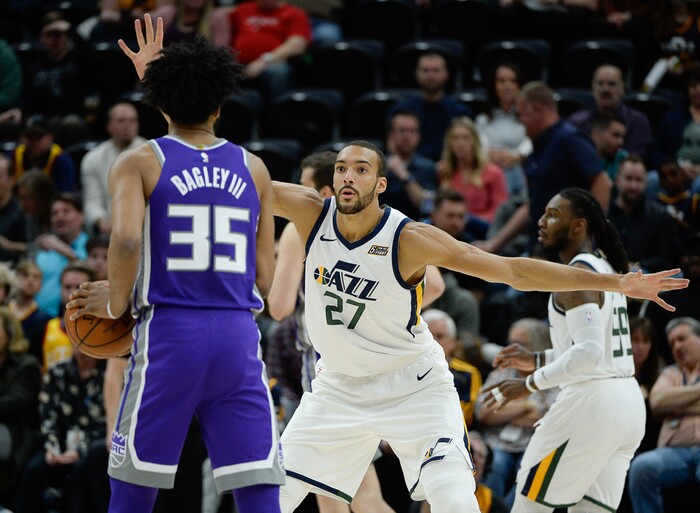 (Francisco Kjolseth  |  The Salt Lake Tribune)  Utah Jazz center Rudy Gobert (27) shows his wingspan as Sacramento Kings forward Marvin Bagley III (35) moves in as the Utah Jazz host the Sacramento Kings in their NBA game at Vivint Smart Home Arena Friday, April 5, 2019, in Salt Lake City.