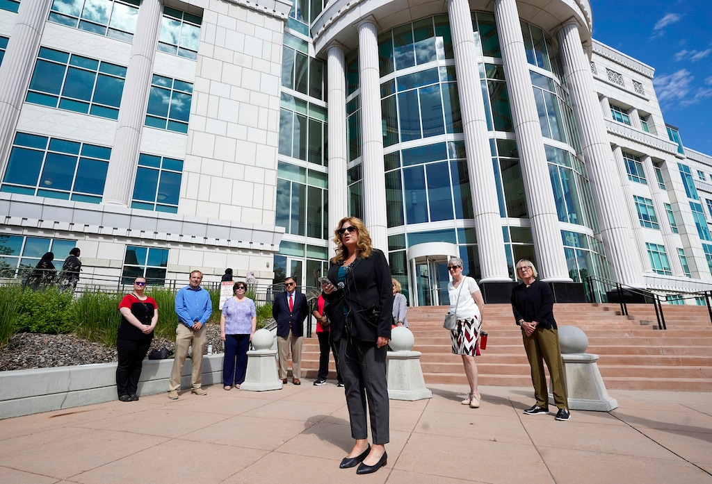 (Chris Samuels | The Salt Lake Tribune) Utah Education Association president Renée Pinkney speaks to media outside the Third District courthouse in Salt Lake City, Wednesday, May 29, 2024. The teacher association announced a lawsuit in May to challenge the Utah Fits All voucher program.
