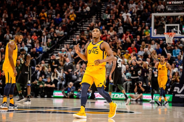 (Trent Nelson | The Salt Lake Tribune)  Utah Jazz guard Donovan Mitchell (45) celebrates a score as the Utah Jazz host the Milwaukee Bucks, NBA basketball in Salt Lake City Saturday November 25, 2017.