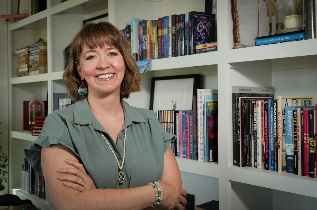 (Bethany Baker | The Salt Lake Tribune) Shannon Hale, a Utah-based author, poses for a portrait at her home in South Jordan's Daybreak on Thursday, Aug. 31, 2023, in front of the 43 books she has written throughout her career.