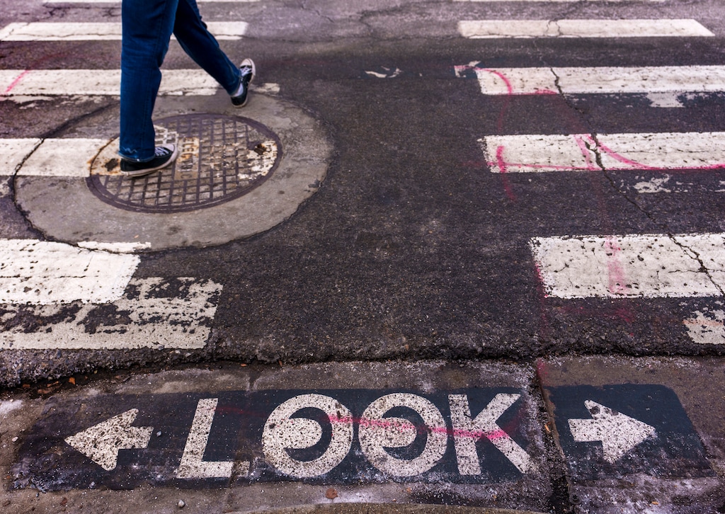 (Leah Hogsten | The Salt Lake Tribune)  A pedestrian crosses 200 South at Edison Street on Friday, February 3, 2023.