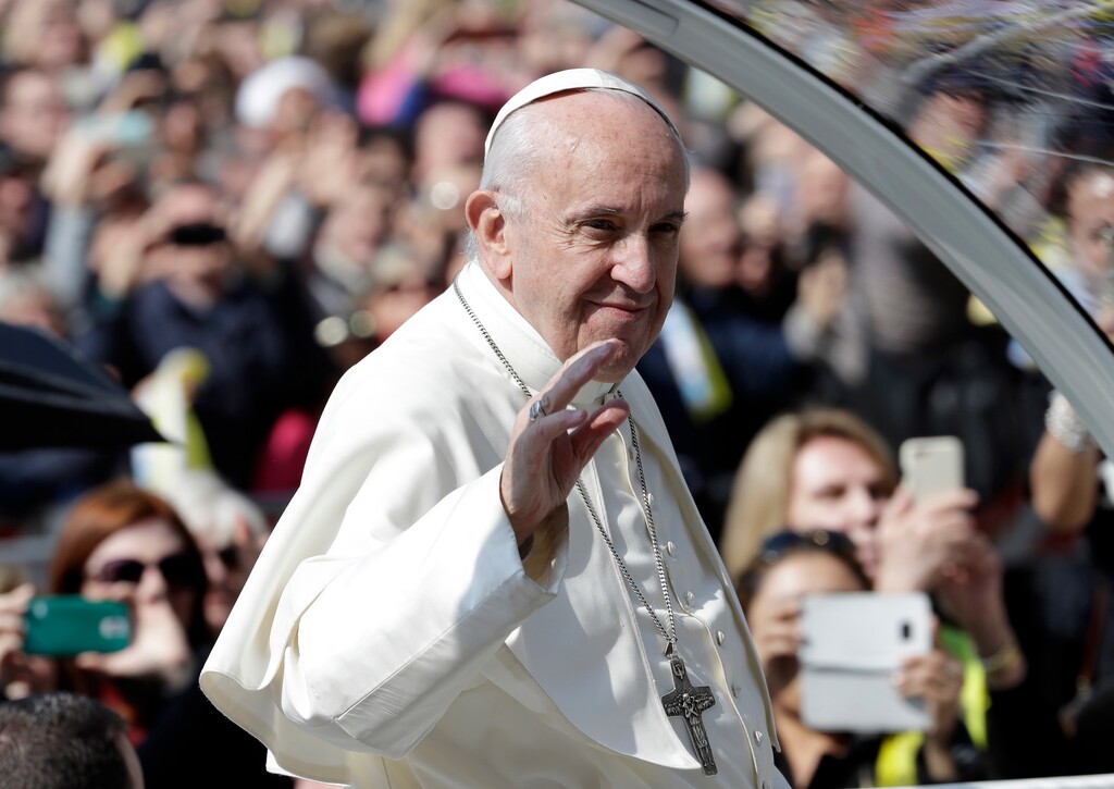 (AP Photo/Luca Bruno) Pope Francis waves to faithful as he leaves Milan’s Duomo Cathedral where he met priests and members of the Catholic Church, as part of his one-day pastoral visit to Monza and Milan, Italy’s second-largest city, Saturday, March 25, 2017.