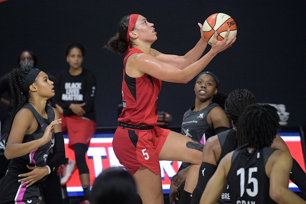 Las Vegas Aces forward Dearica Hamby goes up for a shot during the first half of the team's WNBA basketball game against the Dallas Wings, Tuesday, Aug. 25, 2020, in Bradenton, Fla. (AP Photo/Phelan M. Ebenhack)