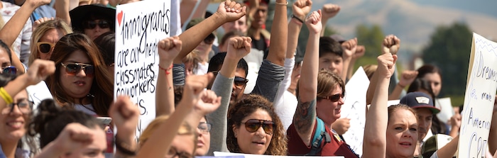 (Leah Hogsten  |  The Salt Lake Tribune) Hundreds of “We are Dreamers,” a Utah pro-Deferred Action for Childhood Arrival (DACA) group, marched in solidarity from the Utah Federal Building to the State Capitol with undocumented immigrants who will be affected by the end of DACA. 