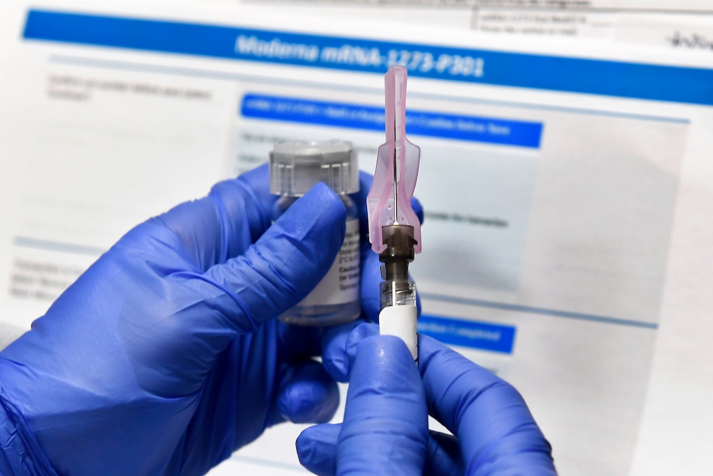 (Hans Penninkm | AP photo)

In this July 27 photo, a nurse prepares a shot as a study of a possible COVID-19 vaccine, developed by the National Institutes of Health and Moderna Inc., gets underway in Binghamton, N.Y.