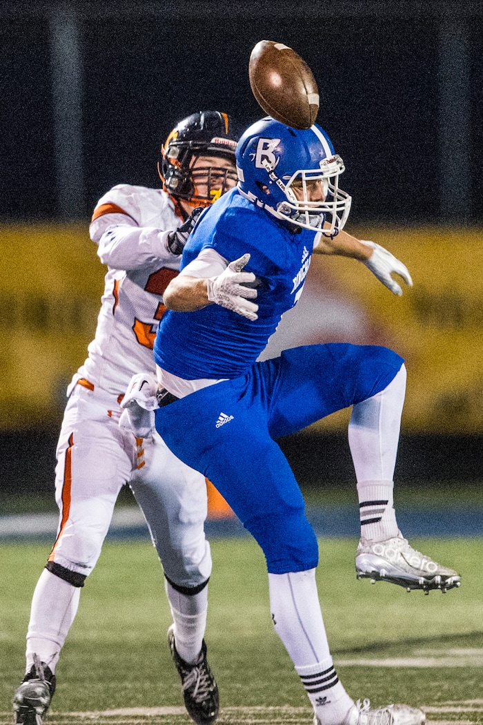 Chris Detrick | The Salt Lake Tribune
Mountain Crest's Cody Olsen (31) breaks up a pass intended for Bingham's Brayden Cosper (7) during the game at Bingham High School Friday November 6, 2015.