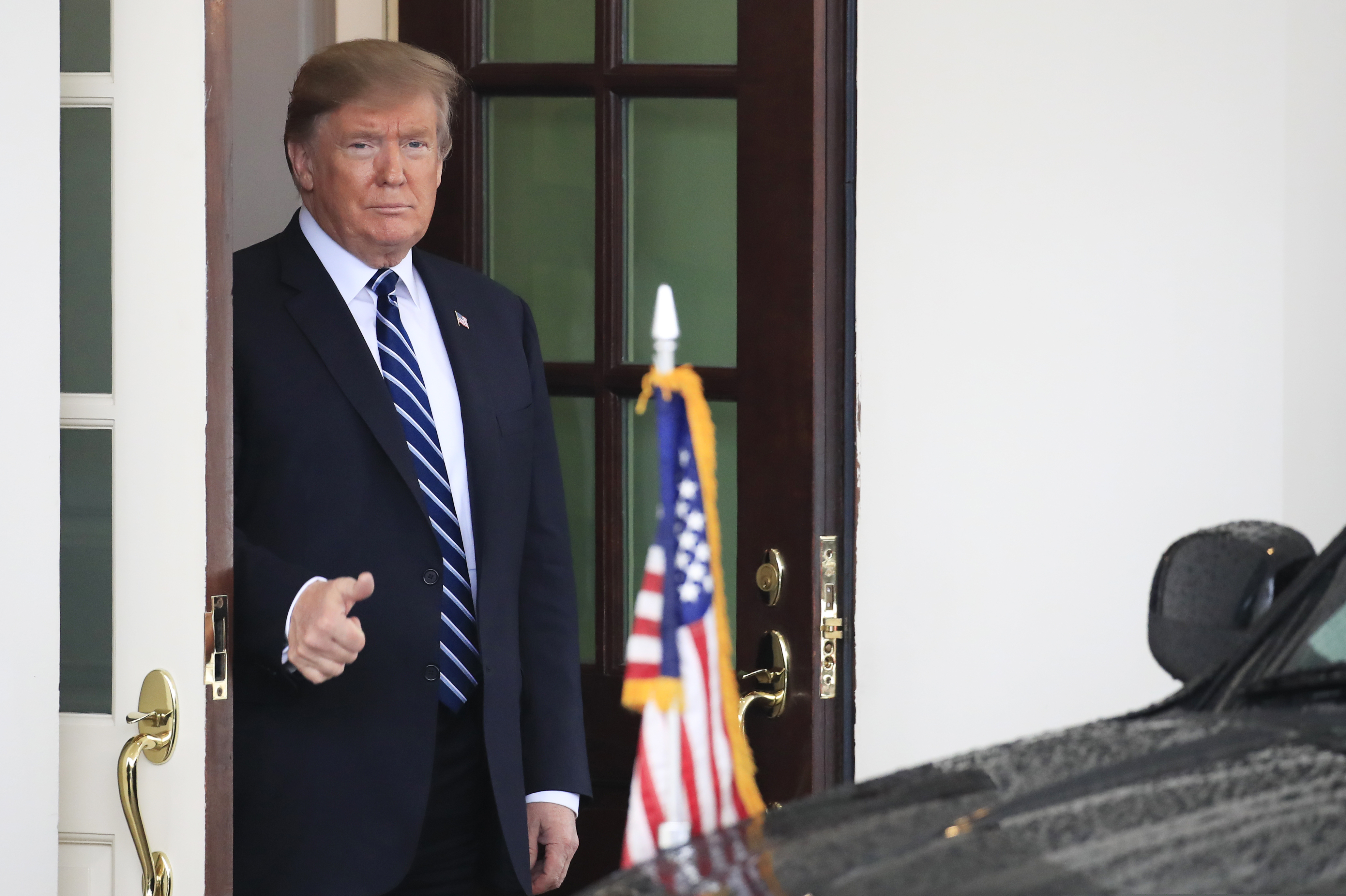 (AP Photo/Manuel Balce Ceneta) President Donald Trump gestures as visiting Austrian Chancellor Sebastian Kurz leaves the White House in Washington following their meeting, Wednesday, Feb. 20, 2019.
