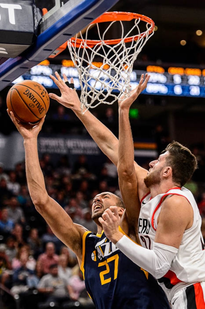 (Trent Nelson | The Salt Lake Tribune)  Utah Jazz center Rudy Gobert (27) shoots with Portland Trail Blazers center Jusuf Nurkic (27) defending as the Utah Jazz host the Portland Trail Blazers, NBA basketball in Salt Lake City, Wednesday November 1, 2017.