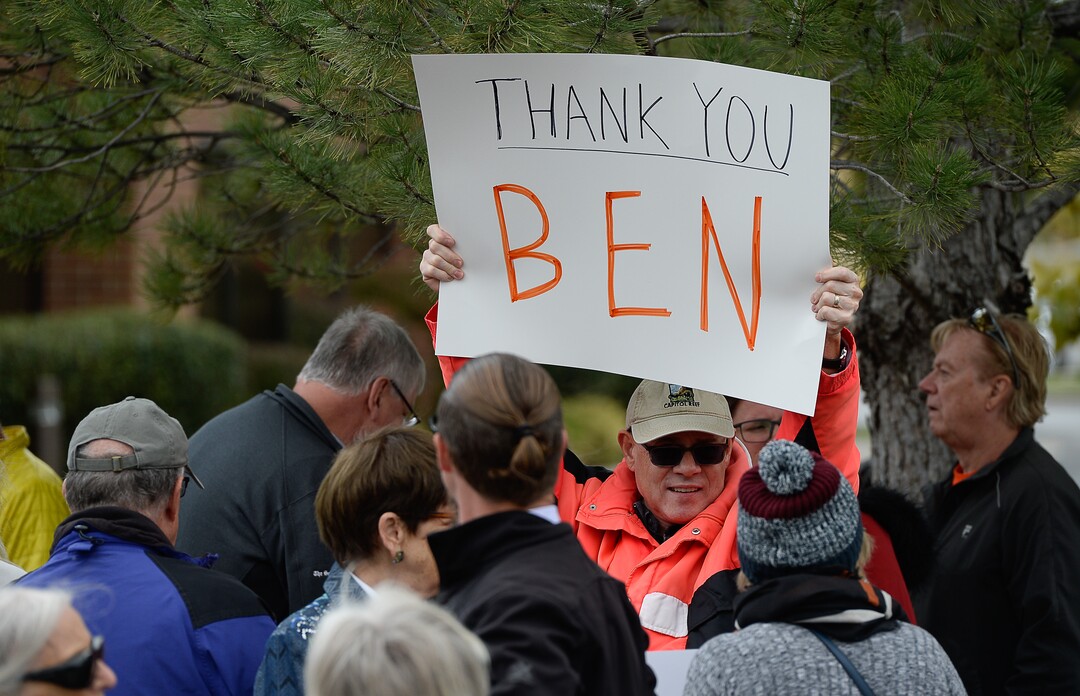 (Francisco Kjolseth | The Salt Lake Tribune) Tom Meyer shows his side as two competing rallies spar near Rep. Ben McAdams' office in West Jordan, one seeking to support McAdams and one to criticize him for supporting the impeachment inquiry of President Donald Trump on Wednesday, Oct. 9, 2019.