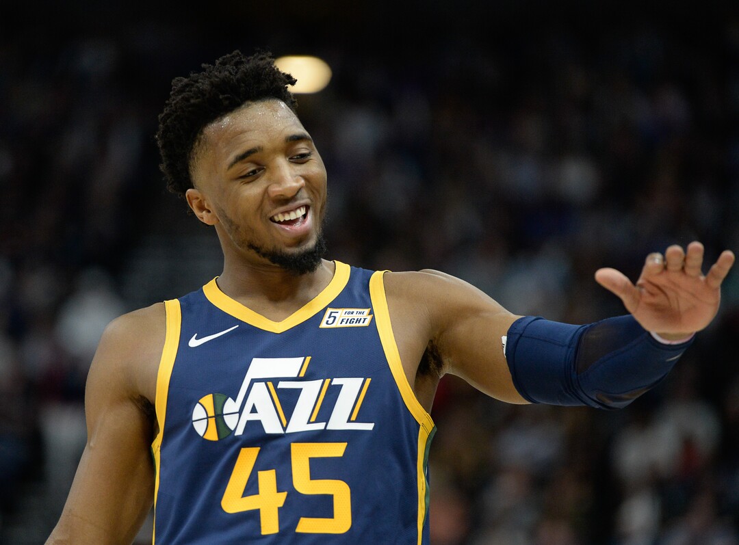 (Francisco Kjolseth  |  The Salt Lake Tribune)  Utah Jazz guard Donovan Mitchell (45) celebrates a teammates three pointer as the Utah Jazz host the New Orleans Pelicans in their NBA basketball game at Vivint Smart Home Arena in Salt Lake City on Sat. Nov. 23, 2019.
