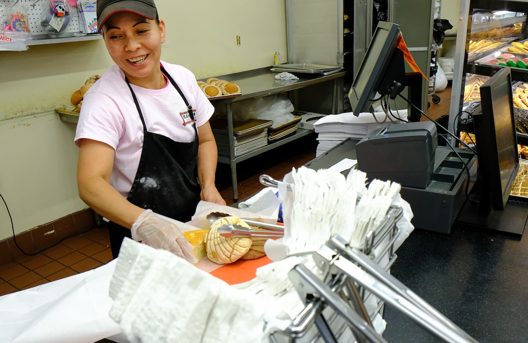 (Francisco Kjolseth  |  The Salt Lake Tribune)  Izelda Vazquez checks out a customer purchasing traditional Mexican breads and pastries at Rancho Market at North Temple and 900 West, a chain that started in 2006 and now has 10 stores. The owner says half of their shoppers are Latino, and it caters to other immigrant groups and long-time residents. New Census numbers show a continuing growth of minorities in Utah. Minorities have grown by 132k since the 2010 Census in Utah, and the Latino population has grown by 76k since then.