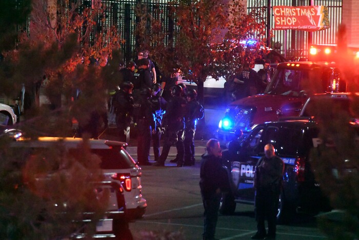 Emergency crews and police work at the scene in response to a shooting at Walmart in Thornton, Colo., Wednesday, Nov. 1, 2017. Police in suburban Denver say they are responding to a shooting at a Walmart with "multiple parties down." Dozens of police cars and emergency vehicles converged at the store. (John Leyba/The Denver Post via AP)