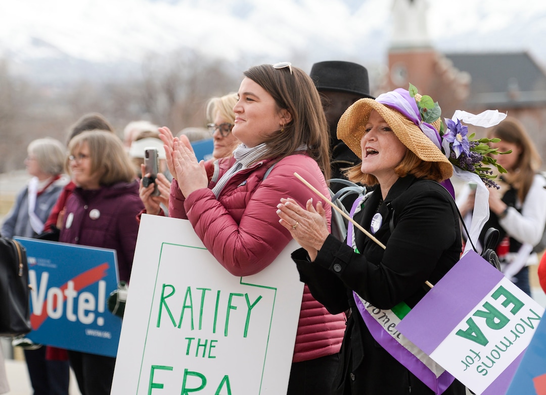 (Leah Hogsten  |  The Salt Lake Tribune) l-r Sara Vranes and Kelly Jones rally with fellow League of Women Voters of Salt Lake and Utah, Friday, Feb. 14, 2020 in celebration of 150 years since Utah women voted, 100 years of the 19th Amendment and the 100th anniversary of League of Women Voters.