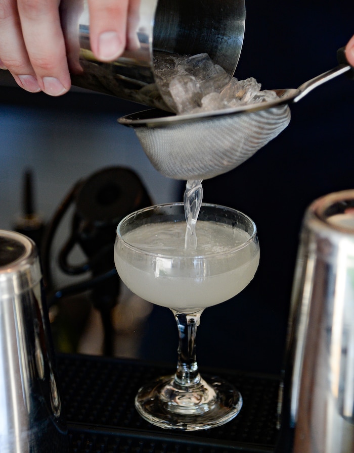 (Francisco Kjolseth  |  The Salt Lake Tribune)  Greg Burrow serves up a Sir Elder with water pocket rum, elderflower, lime and simple syrup at Oquirrh, a new fine-dining restaurant in downtown Salt Lake City.
