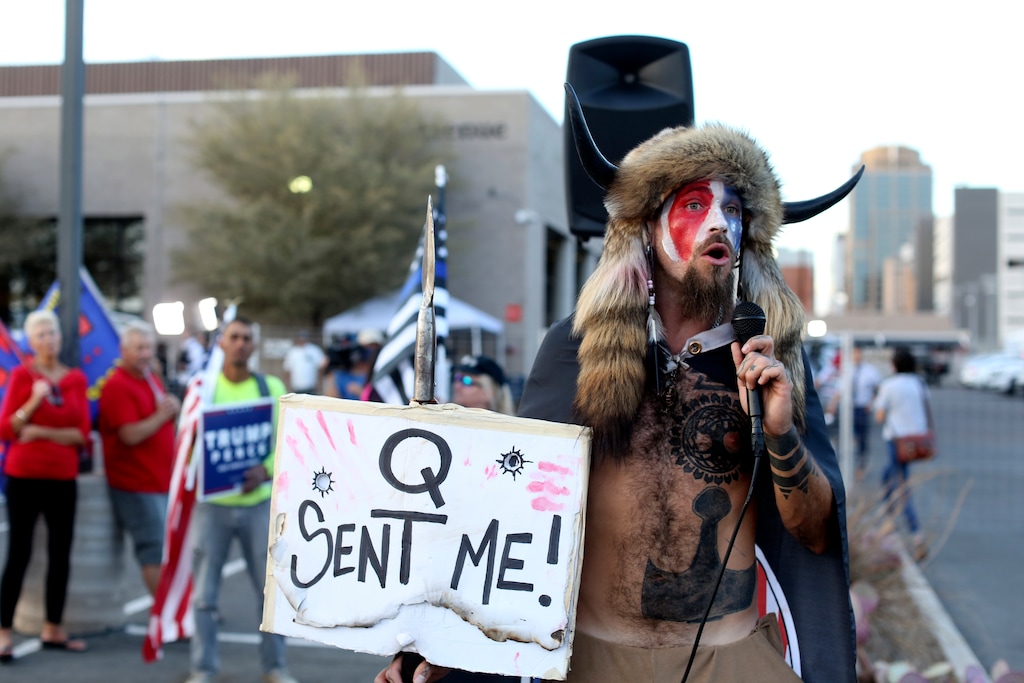 (Dario Lopez-Mills | AP photo)
In this Nov. 5, 2020, photo, Jacob Anthony Chansley, who also goes by the name Jake Angeli, a Qanon believer speaks to a crowd of President Donald Trump supporters outside of the Maricopa County Recorder's Office where votes in the general election were being counted, in Phoenix.
