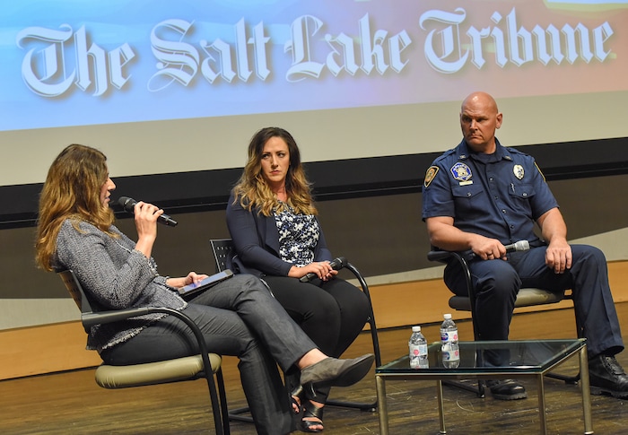 (Francisco Kjolseth | The Salt Lake Tribune) Tribune Editor Jennifer Napier-Pearce, left, moderates a conversation with police officers and firefighters about mental health at the Salt Lake Public Library on Thursday, May 24, 2018. Panelists included Shante Johnson, spokeswoman for the Utah State Lodge Fop (Fraternal Order of Police) and the widow of Sgt. Derek Johnson, who was killed in the line of duty, center, and Salt Lake City Fire Capt. Mike Stevens, an advocate for better mental health care for firefighters.