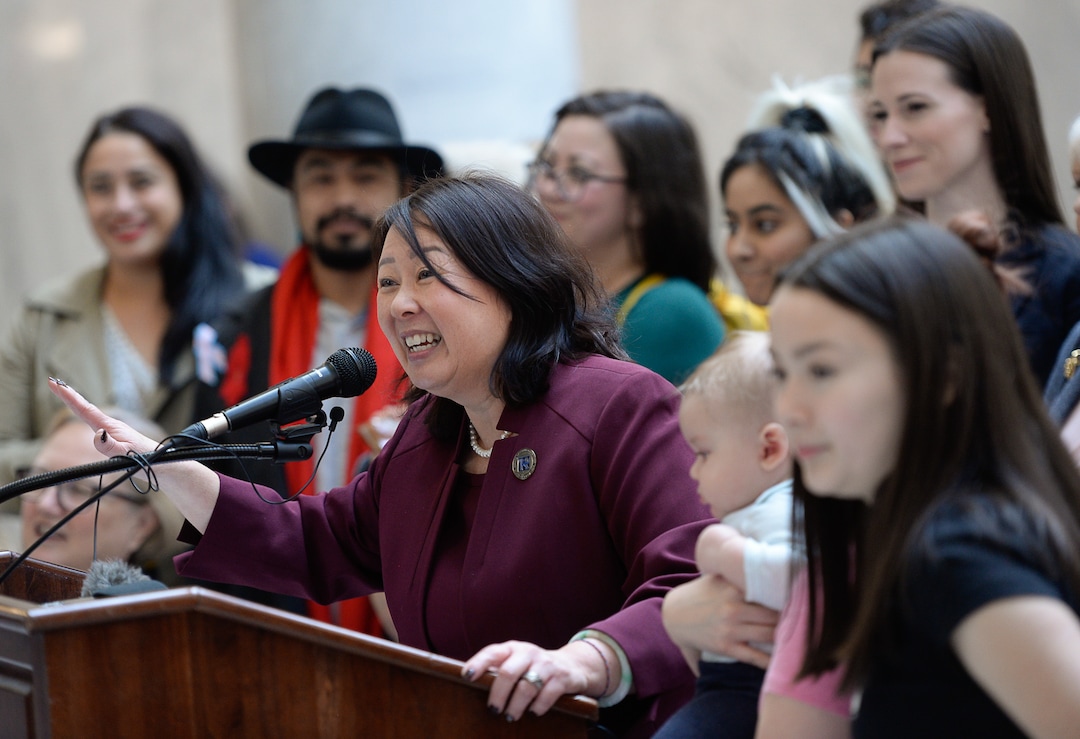 (Francisco Kjolseth  |  The Salt Lake Tribune)  Utah Rep. Karen Kwan, D-Murray, sponsor of a joint resolution that ratifies the Equal Rights Amendment to the U.S. Constitution, is joined by other local supporters of the ERA during a rally at the Utah Capitol on Tuesday, Dec. 3, 2019.