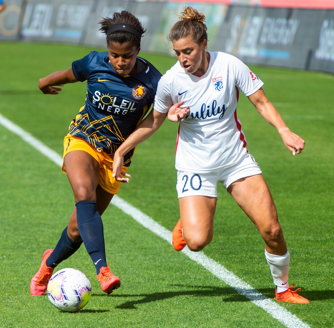(Rick Egan  |  The Salt Lake Tribune) Utah Royals FC midfielder  Elizabeth Ball (7) goes for the ball along with OL Reign FC attacker SofiaHuerta, in soccer action between Utah Royals FC and Ol Reign FC at Rio Tinto Stadium in Sandy, Saturday, Sept. 26, 2020.