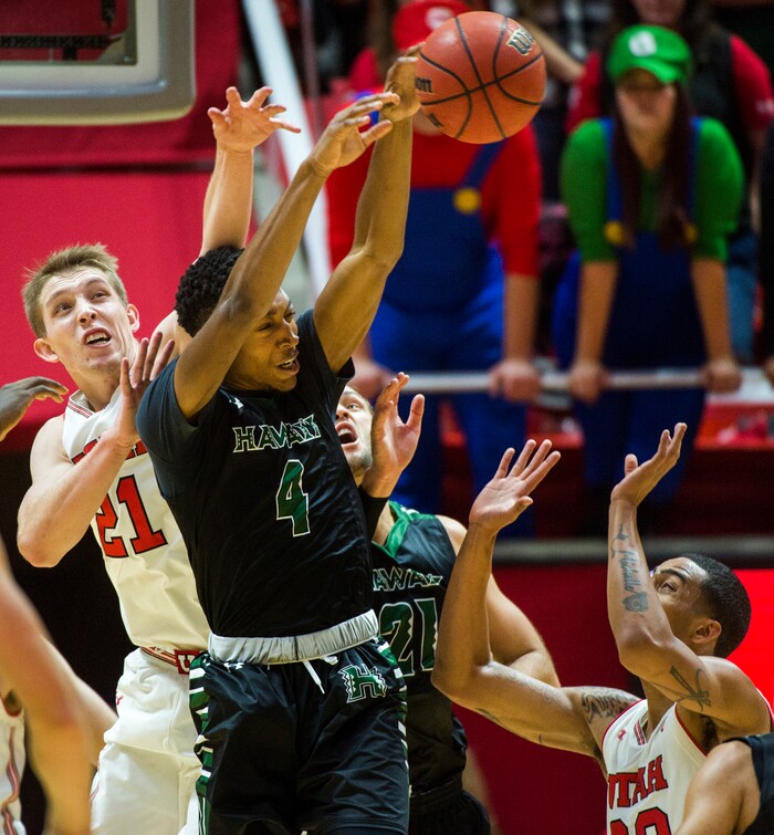 (Rick Egan  |  The Salt Lake Tribune)  Utah Utes forward Tyler Rawson (21) and Utah Utes guard Gabe Bealer (30) double-team Hawaii Warriors guard Brandon Thomas (4), in basketball action, Utah Utes vs Hawaii Warriors, at the Jon M. Huntsman Center, Saturday, December 2, 2017.