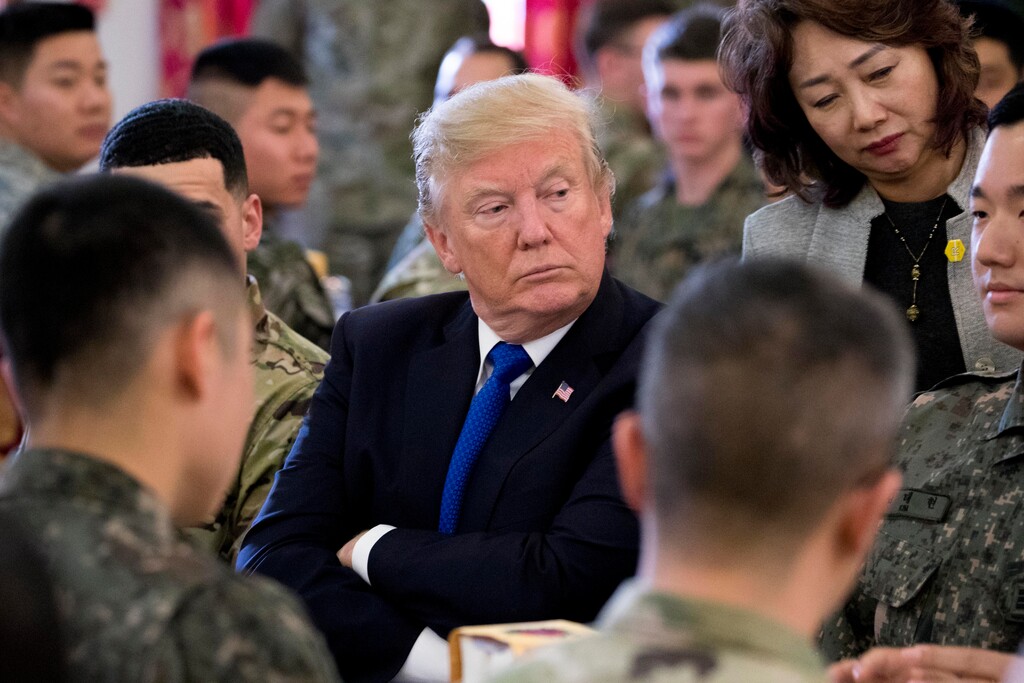 President Donald Trump has lunch with U.S. and South Korean troops along with South Korean President Moon Jae-in at Camp Humphreys in Pyeongtaek, South Korea, Tuesday, Nov. 7, 2017. Trump is on a five country trip through Asia traveling to Japan, South Korea, China, Vietnam and the Philippines. (AP Photo/Andrew Harnik)
