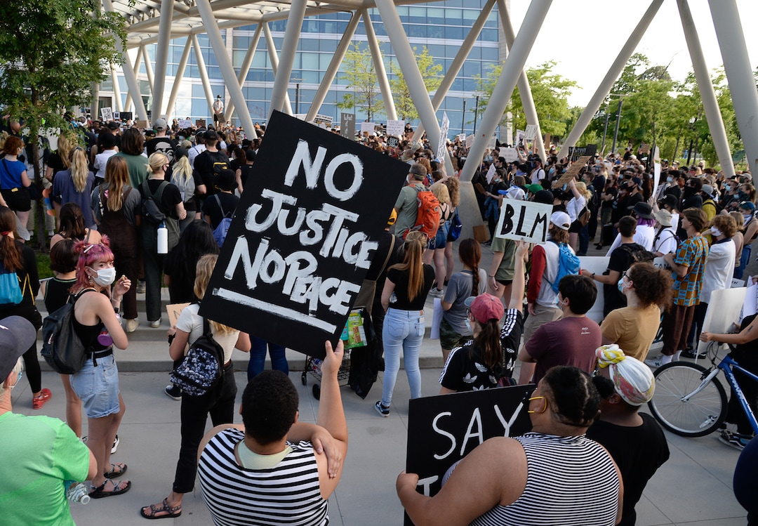 (Francisco Kjolseth  |  The Salt Lake Tribune) Demonstrators protest against police brutality at the Salt Lake City Public Safety Building on Wednesday, June 3, 2020, as the initially set 8 p.m. weeklong curfew was removed.