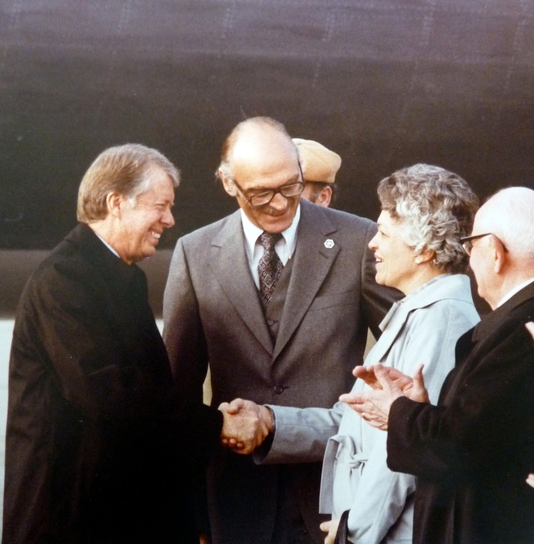 (photo courtesy Ron Fox) Norma Matheson shakes hands with President Jimmy Carter as her husband, Governor Scott Matheson looks on.