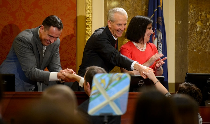 (Steve Griffin  |  The Salt Lake Tribune) Speaker of the House Greg Hughes and Senate President Wayne Niederhauser shake hands with Gov. Gary Herbert and First Lady Jeanette Herbert as they enter the Utah House of Representatives prior to the governor's State of the State address in Salt Lake City Wednesday January 24, 2018.