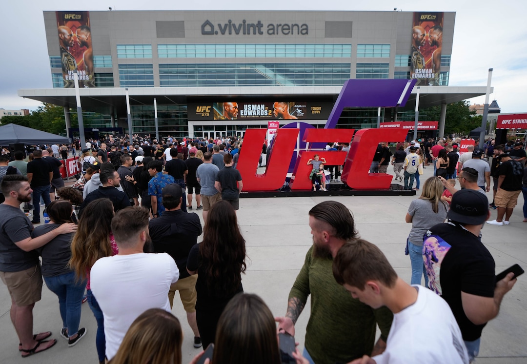 (Francisco Kjolseth | The Salt Lake Tribune) People line up outside of Vivint Arena for the start of UFC 278 mixed martial arts title bouts in Salt Lake City on Saturday, Aug. 20, 2022.