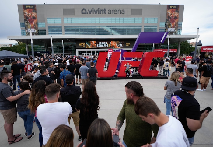 (Francisco Kjolseth | The Salt Lake Tribune) People line up outside of Vivint Arena for the start of UFC 278 mixed martial arts title bouts in Salt Lake City on Saturday, Aug. 20, 2022.