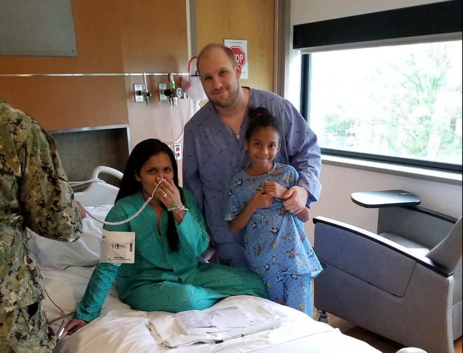 (Courtesy of Laurie Holt, Facebook post) Josh Holt, his wife, Thamy, and their daughter, Marian, were being treated at Walter Reed Military Medical Center in Bethesda, Md., on Sunday, May 27, 2018.