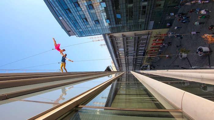 (Photo courtesy of BANDALOOP) Oakland, Calif.-based “vertical dance” company BANDALOOP will be appearing at the Utah Arts Festival June 21-24, and will perform twice daily (5:30 and 7 p.m.) on the six-story library glass wall above the reflecting pool.