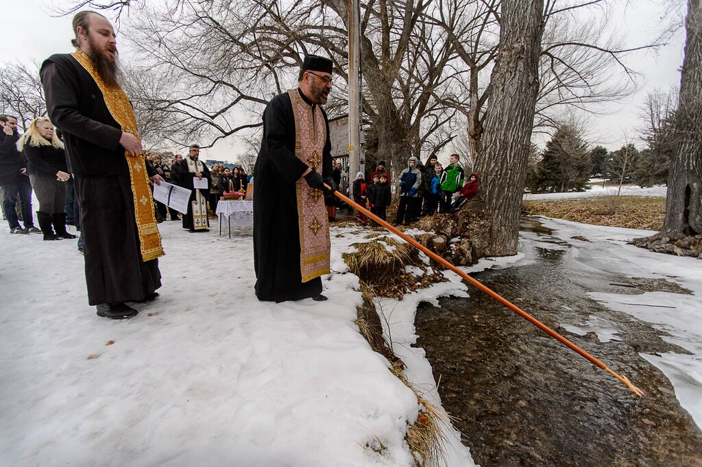 Trent Nelson  |  The Salt Lake Tribune
The Rev. Elias Koucos, center, commemorates the feast of the Epiphany with the Rev. Justin Havens, left, as the Greek Orthodox of Greater Salt Lake holds the annual outdoor blessing of the water at Sugar House Park in Salt Lake City, Wednesday Jan. 6, 2016.