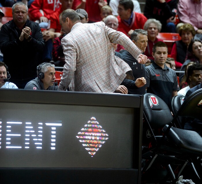 (Steve Griffin  |  The Salt Lake Tribune) University of Utah head coach Larry Krystkowiak flips a chair as he leaves the court after he was ejected from the game during the Utah versus UC Davis men's NIT basketball game at the Huntsman Center in Salt Lake City Wednesday March 14, 2018. 
