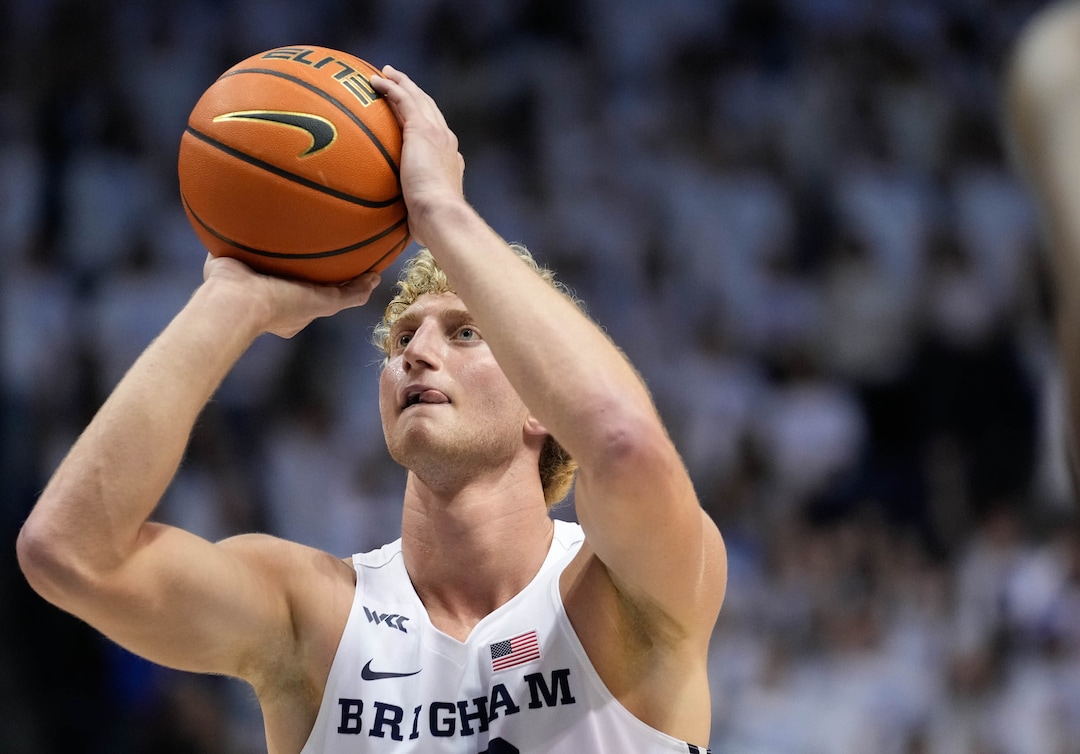 (Francisco Kjolseth | The Salt Lake Tribune) Brigham Young Cougars forward Caleb Lohner (33) shoots a free throw in WCC basketball action between the Brigham Young Cougars and the Portland Pilots, at the Marriott Center, on Saturday, January 22, 2022.