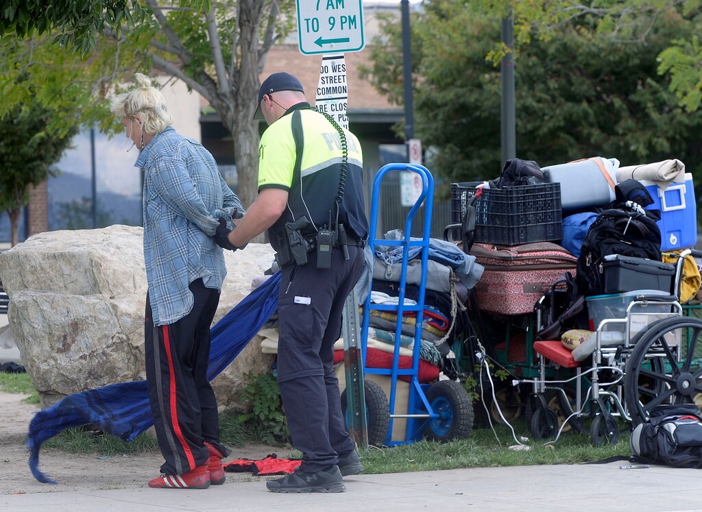 (Al Hartmann  |  Tribune file photo  Salt Lake City Police check identifications and made arrests in a sweep of the Rio Grande neighborhood in downtown Salt Lake City last September as part of "Operation Diversion." A new crackdown, dubbed "Operation Rio Grande" is expected any day.