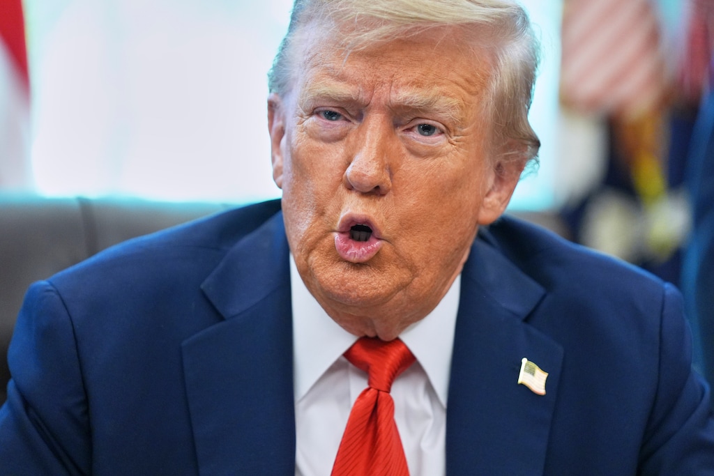 President Donald Trump speaks as he signs executive orders in the Oval Office of the White House, Monday, Aug. 25, 2025, in Washington. (AP Photo/Evan Vucci)