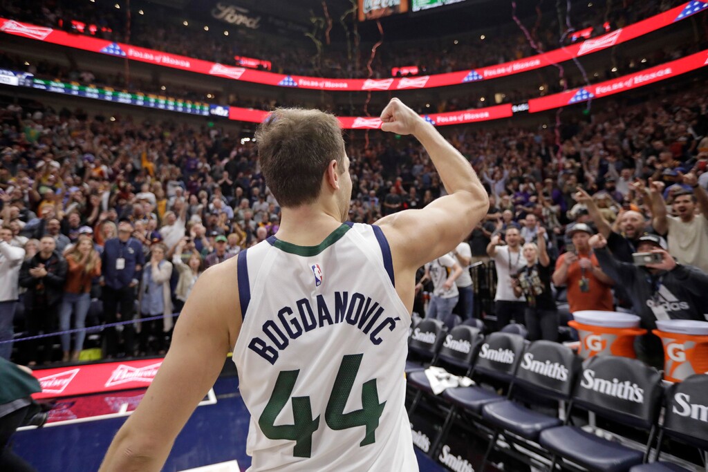 Utah Jazz forward Bojan Bogdanovic (44) pumps his fist to the fans after scoring the winning shot in the team's NBA basketball game against the Milwaukee Bucks on Friday, Nov. 8, 2019, in Salt Lake City. (AP Photo/Rick Bowmer)