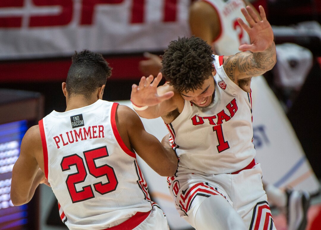 (Rick Egan | The Salt Lake Tribune) Utah Utes guard Alfonso Plummer (25) celebrates with Utah Utes forward Timmy Allen (1) after scoring a quick basket as time expired in the first half, in PAC12 Basketball action between the Utah Utes and the California Golden Bears, on Wednesday, Jan. 16, 2021.