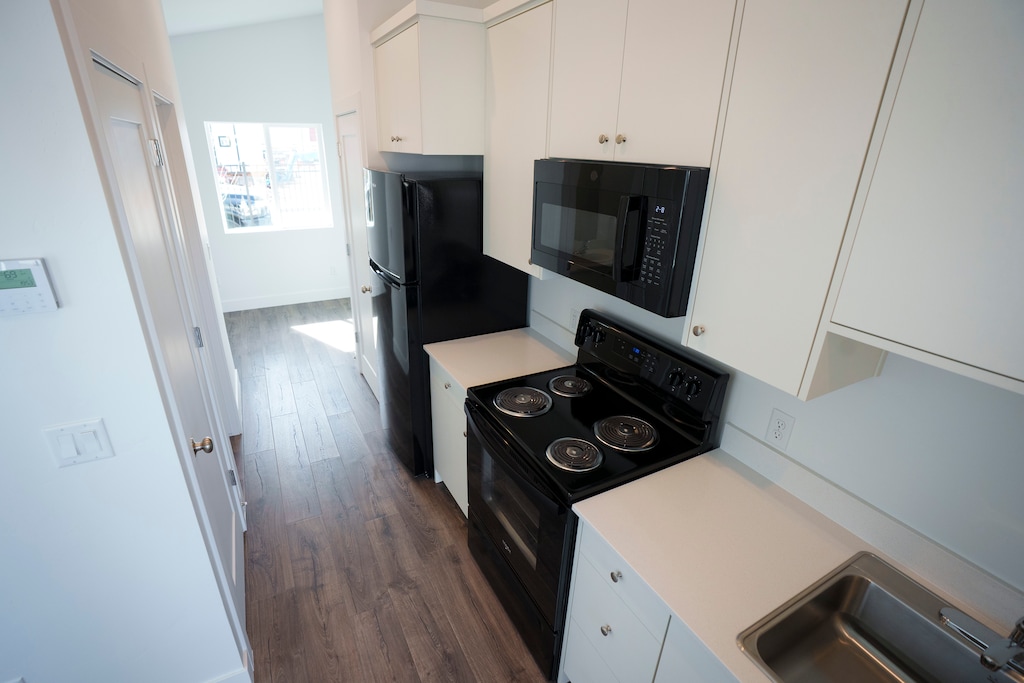 (Bethany Baker | The Salt Lake Tribune) Appliances inside a new tiny duplex at The Other Side Village in Salt Lake City on Thursday, March 12, 2026.