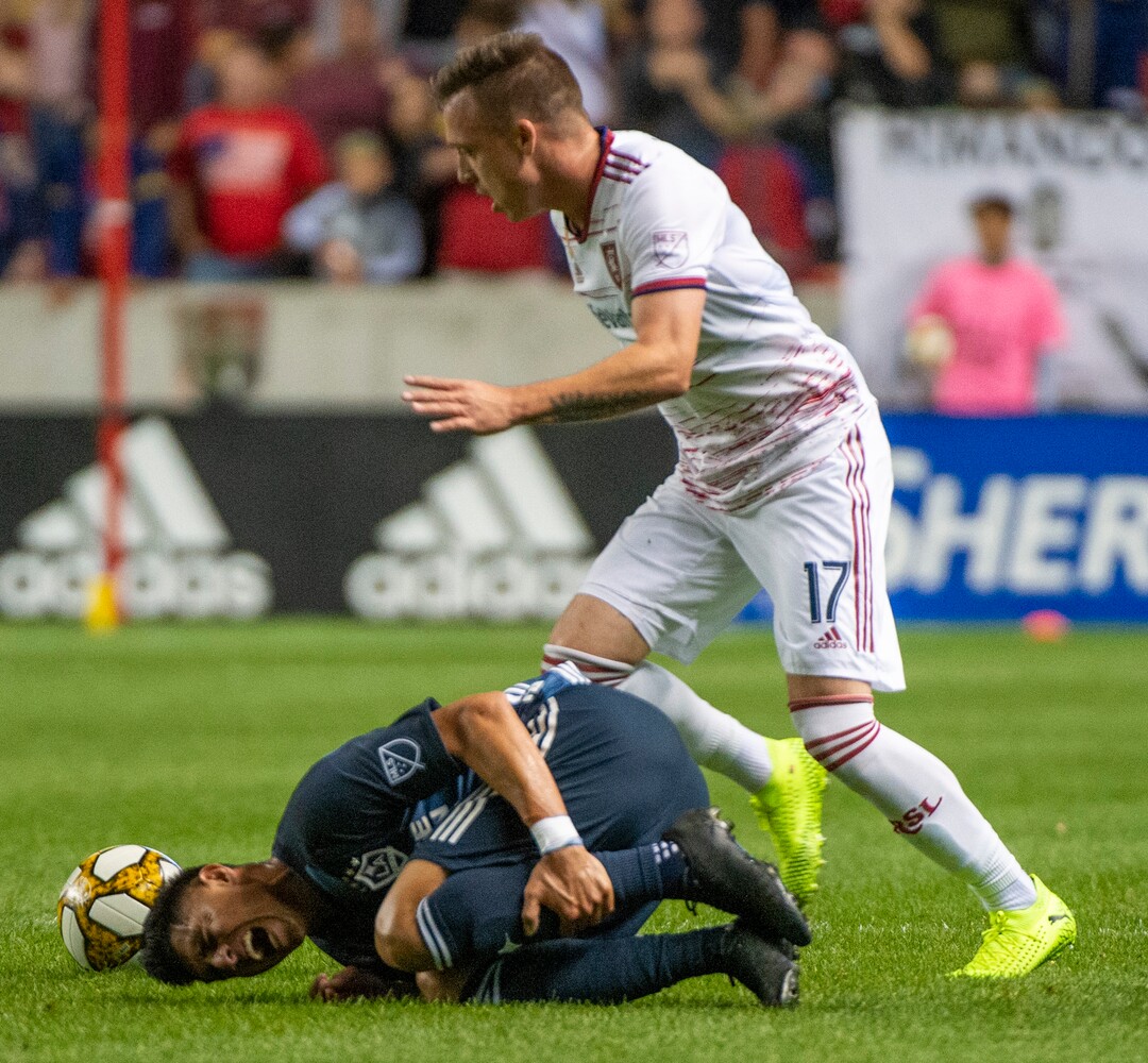 (Rick Egan  |  The Salt Lake Tribune)Los Angeles Galaxy midfielder Joe Corona (14) reacts after colliding with Real Salt Lake forward Jefferson Savarino (7), in MLS soccer action between Real Salt Lake and Los Angeles Galaxy at Rio Tinto Stadium, Wednesday, Sept. 25, 2019.
